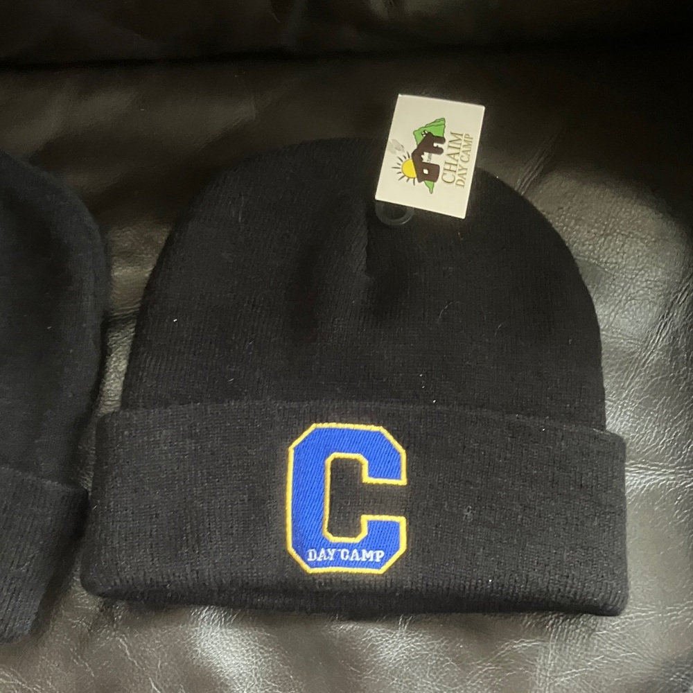 Black Beanie with Gold Embroidery and blue and gold embroidered emblem large “C”